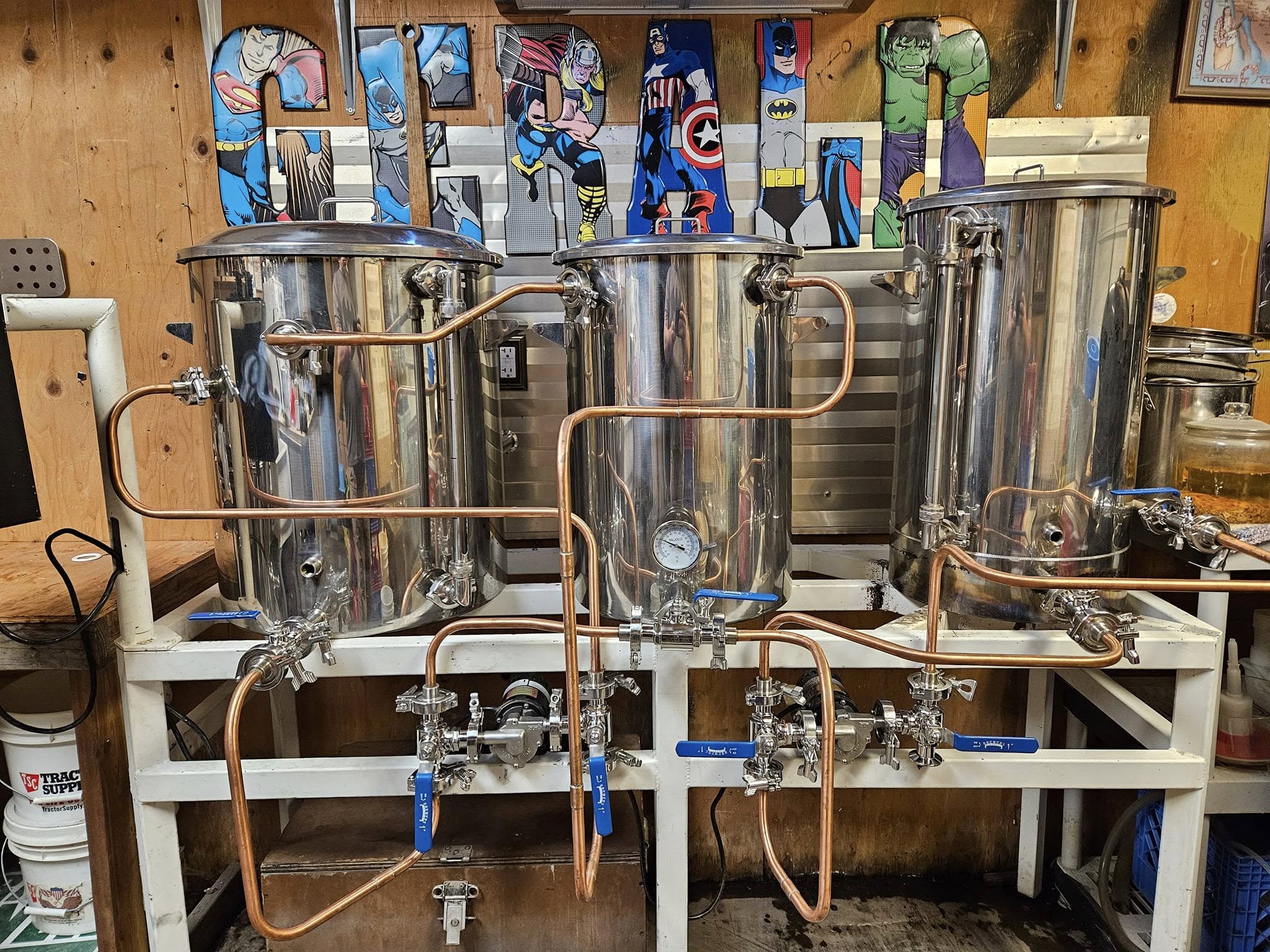 Gerald Turner Brewery's HERMS brewing system in Bright lighting, showcasing stainless steel equipment